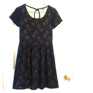 Black mini dress with nude undertone. Worn once!!